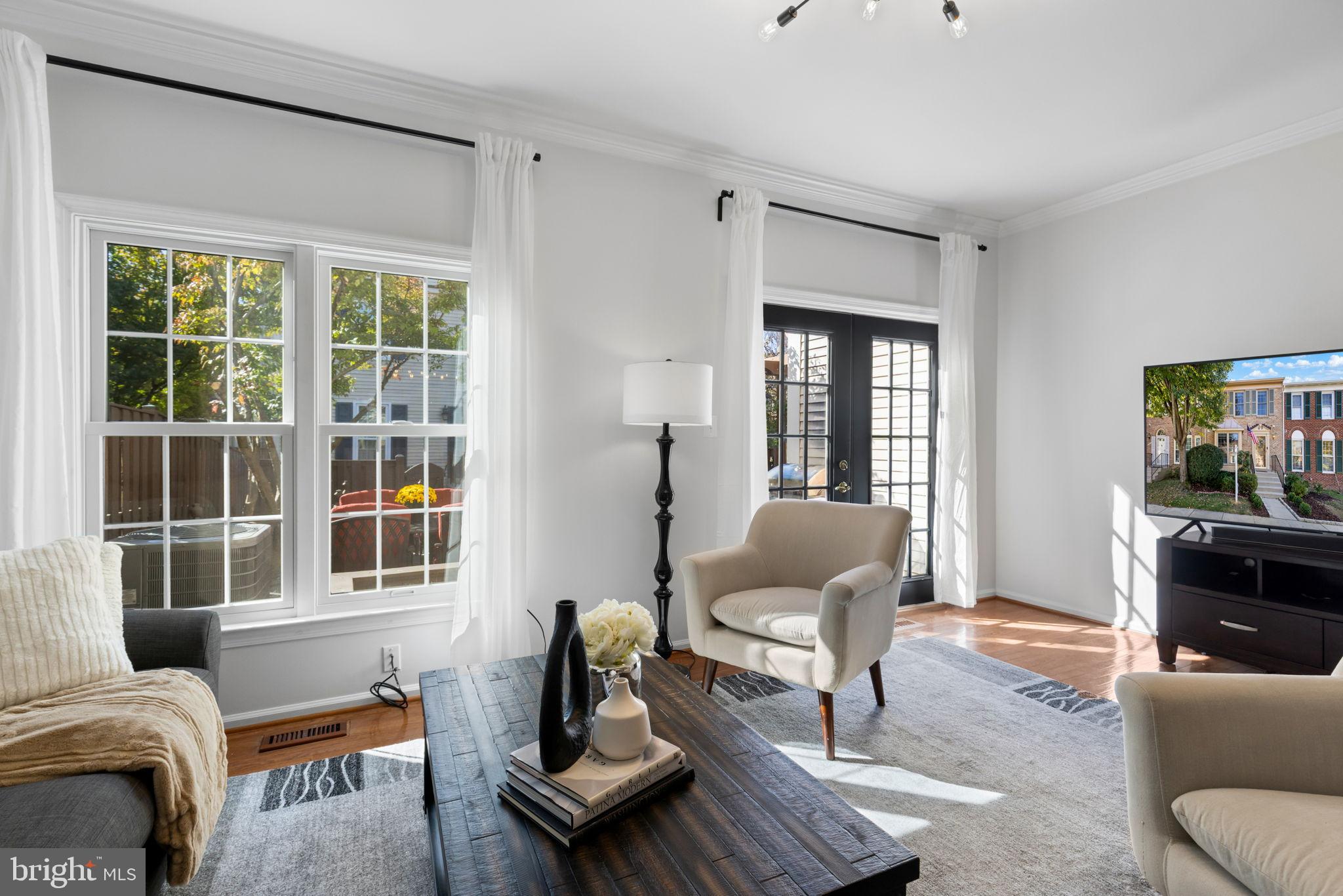 6223 Walkers Croft Way Alexandria, VA 22315 - Photo 16 of 38 a living room with furniture and a window