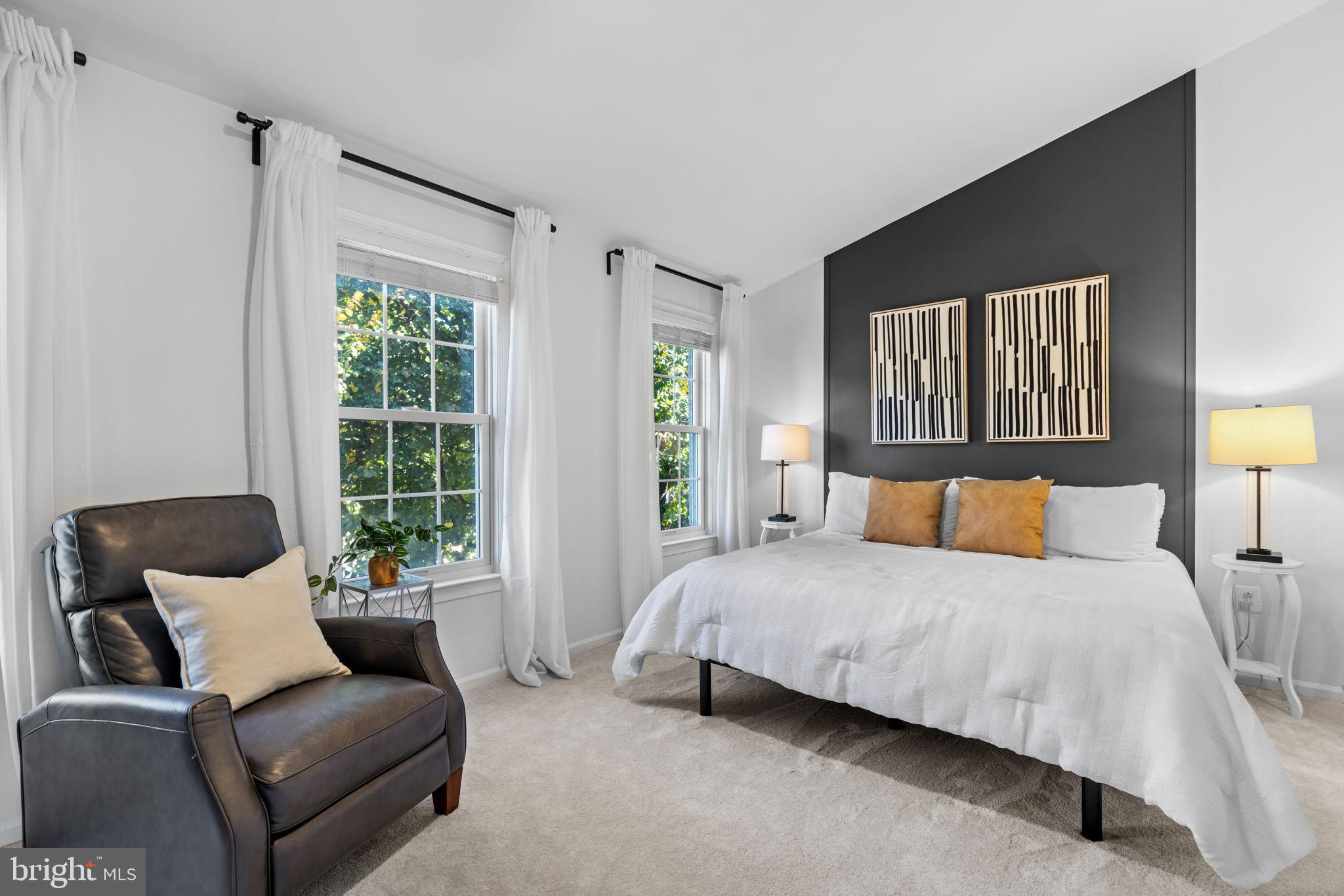 6223 Walkers Croft Way Alexandria, VA 22315 - Photo 20 of 38 a bedroom with a bed and glass window