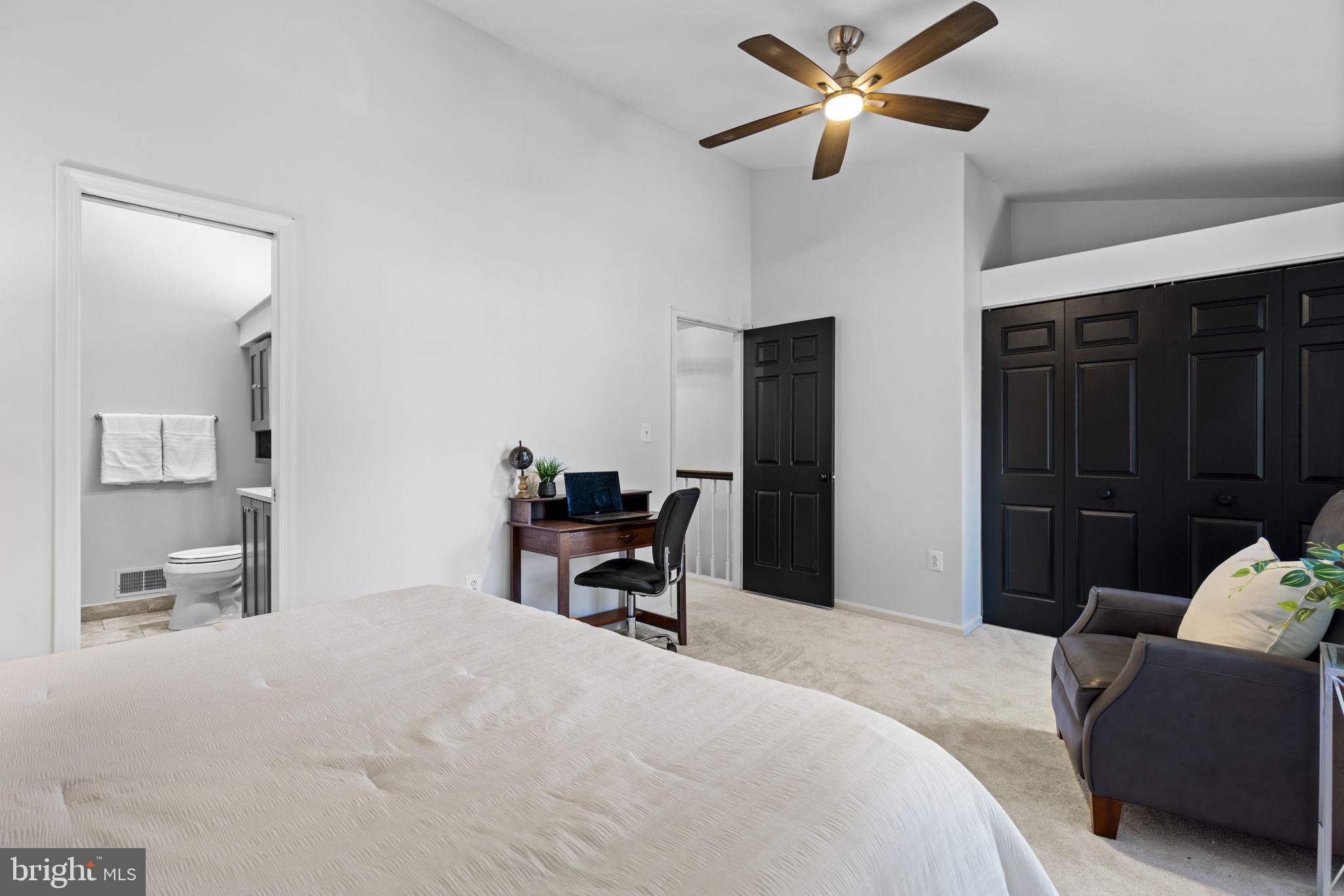 6223 Walkers Croft Way Alexandria, VA 22315 - Photo 22 of 38 a bedroom with a bed and a chair