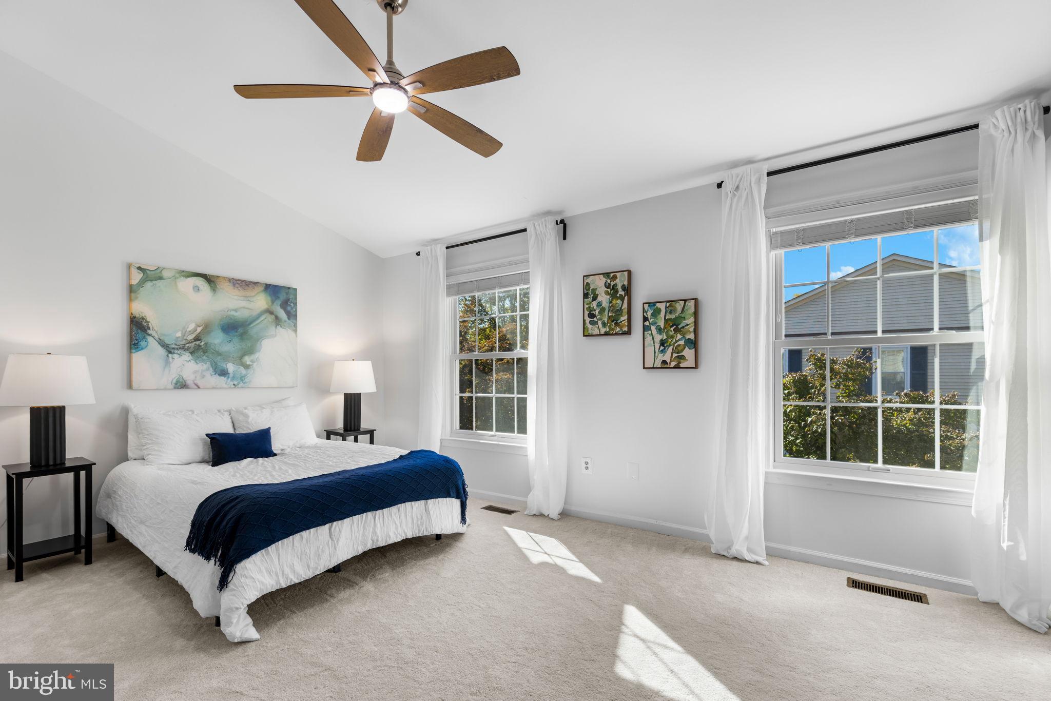 6223 Walkers Croft Way Alexandria, VA 22315 - Photo 25 of 38 a bedroom with a bed and a window