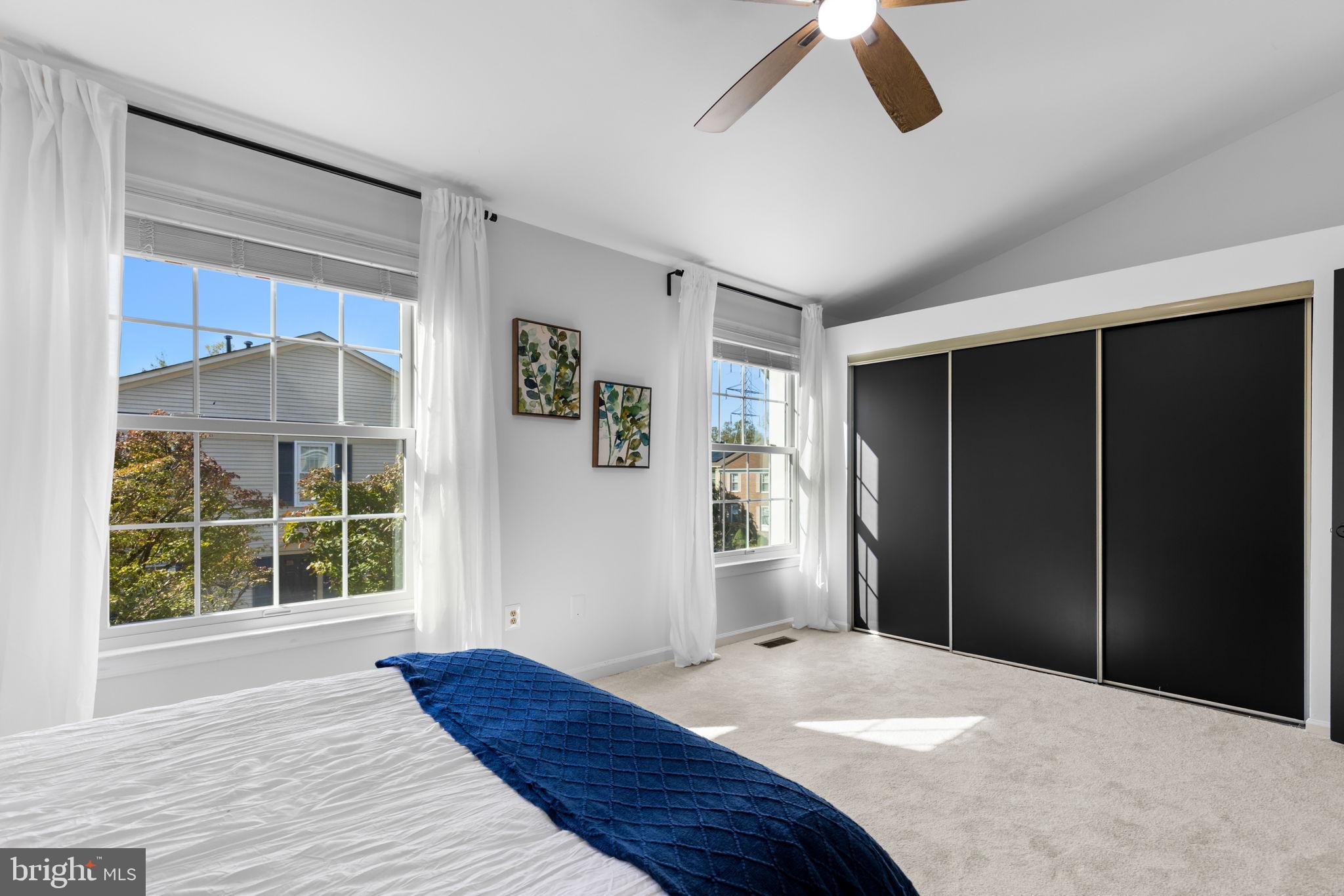 6223 Walkers Croft Way Alexandria, VA 22315 - Photo 27 of 38 a bedroom with a bed and a window