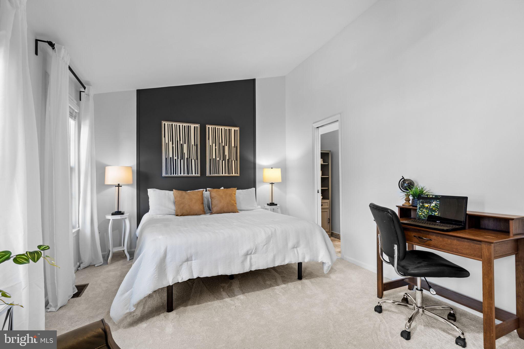 6223 Walkers Croft Way Alexandria, VA 22315 - Photo 4 of 38 a bedroom with a bed and a furniture