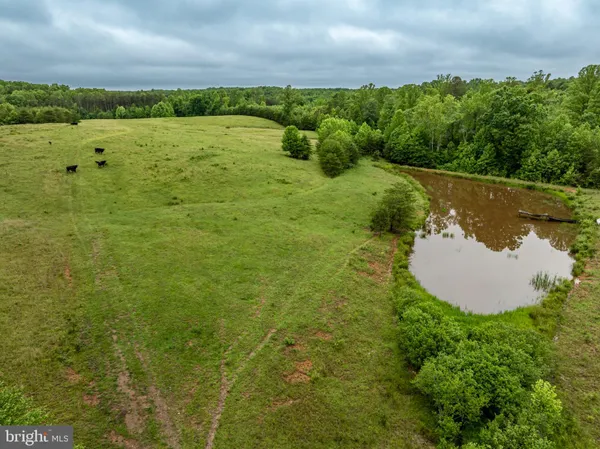 a view of a lake with a yard