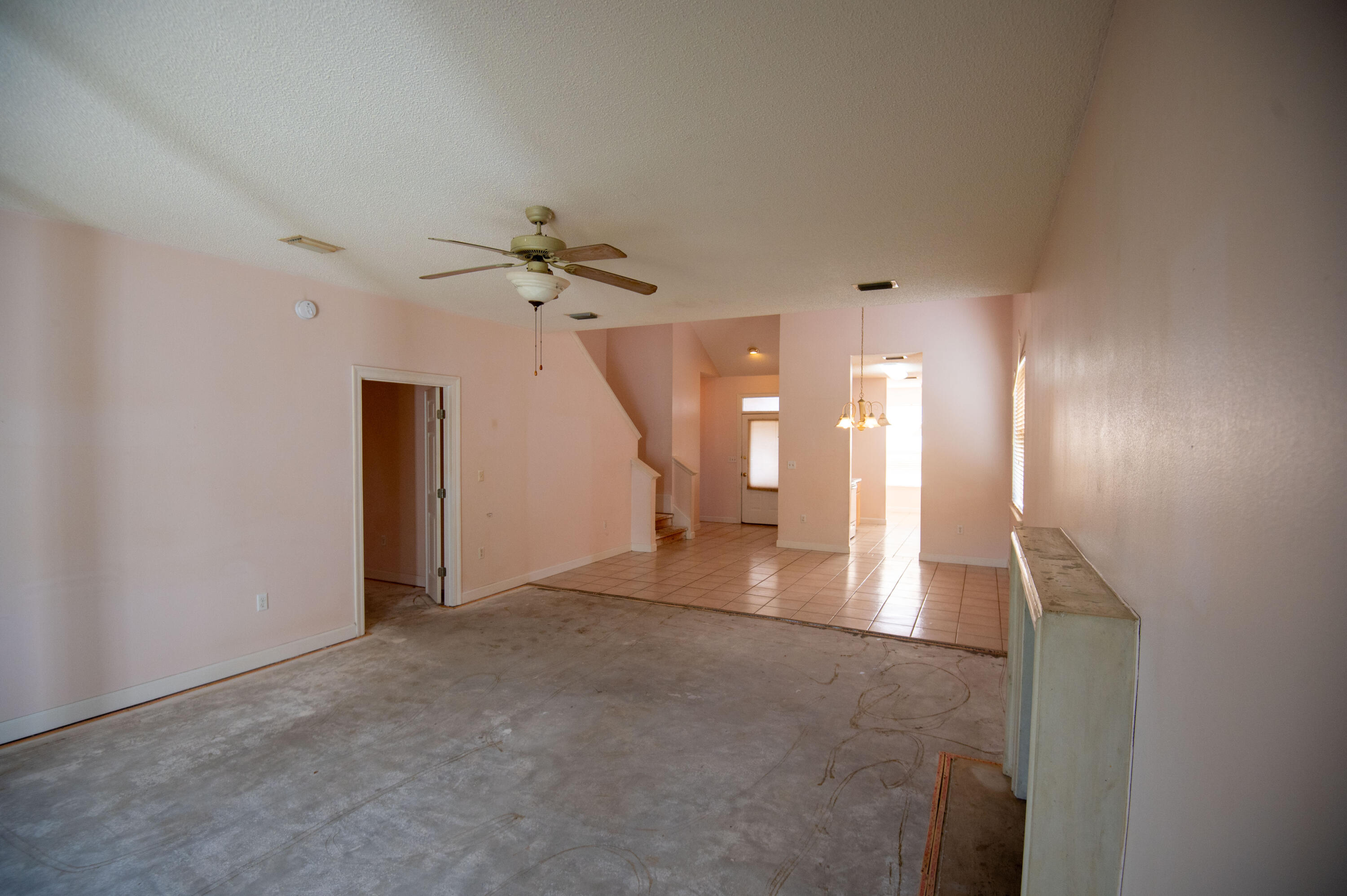 407 Calle Escada Santa Rosa Beach, FL 32459 - Photo 9 of 17 a view of a hallway with staircase