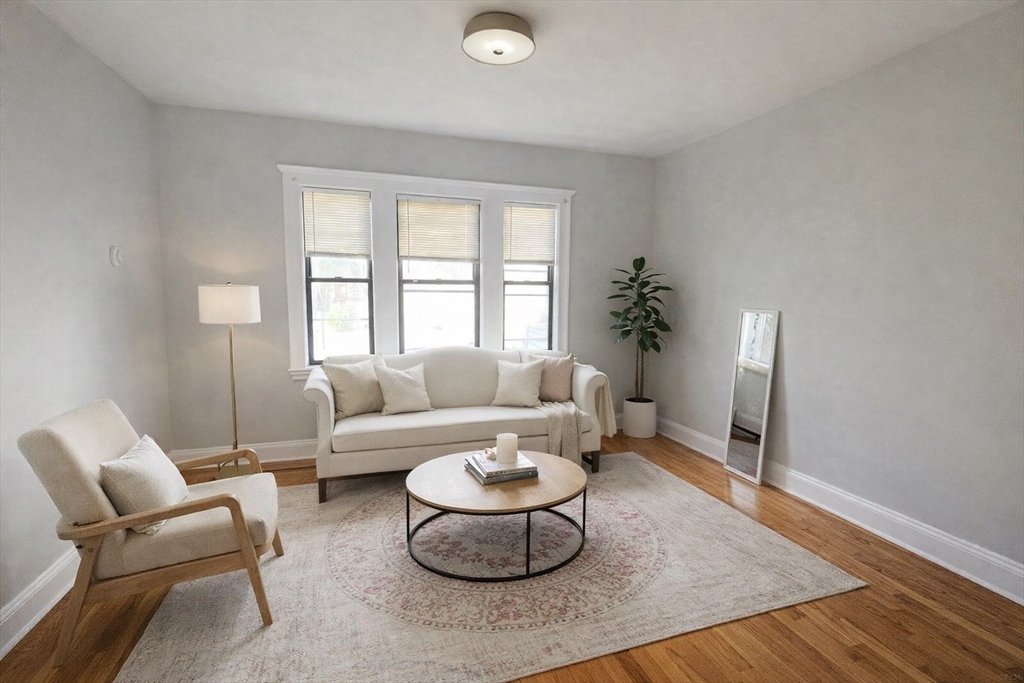 5 Feneno Terrace, Unit 1 Boston, MA 02134 - Photo 1 of 5 a living room with furniture and a potted plant