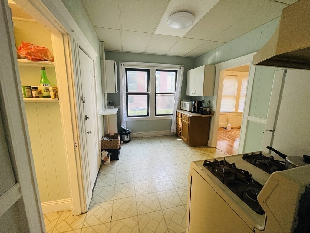 5 Feneno Terrace, Unit 1 Boston, MA 02134 - Photo 4 of 5 a room with furniture and a window