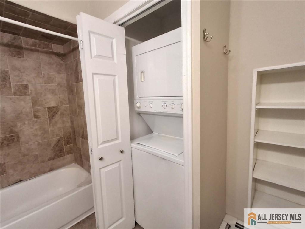 363 Cranbury Road, Unit A3 East Brunswick, NJ 08816 - Photo 5 of 16 a bathroom with a bathtub and a shower