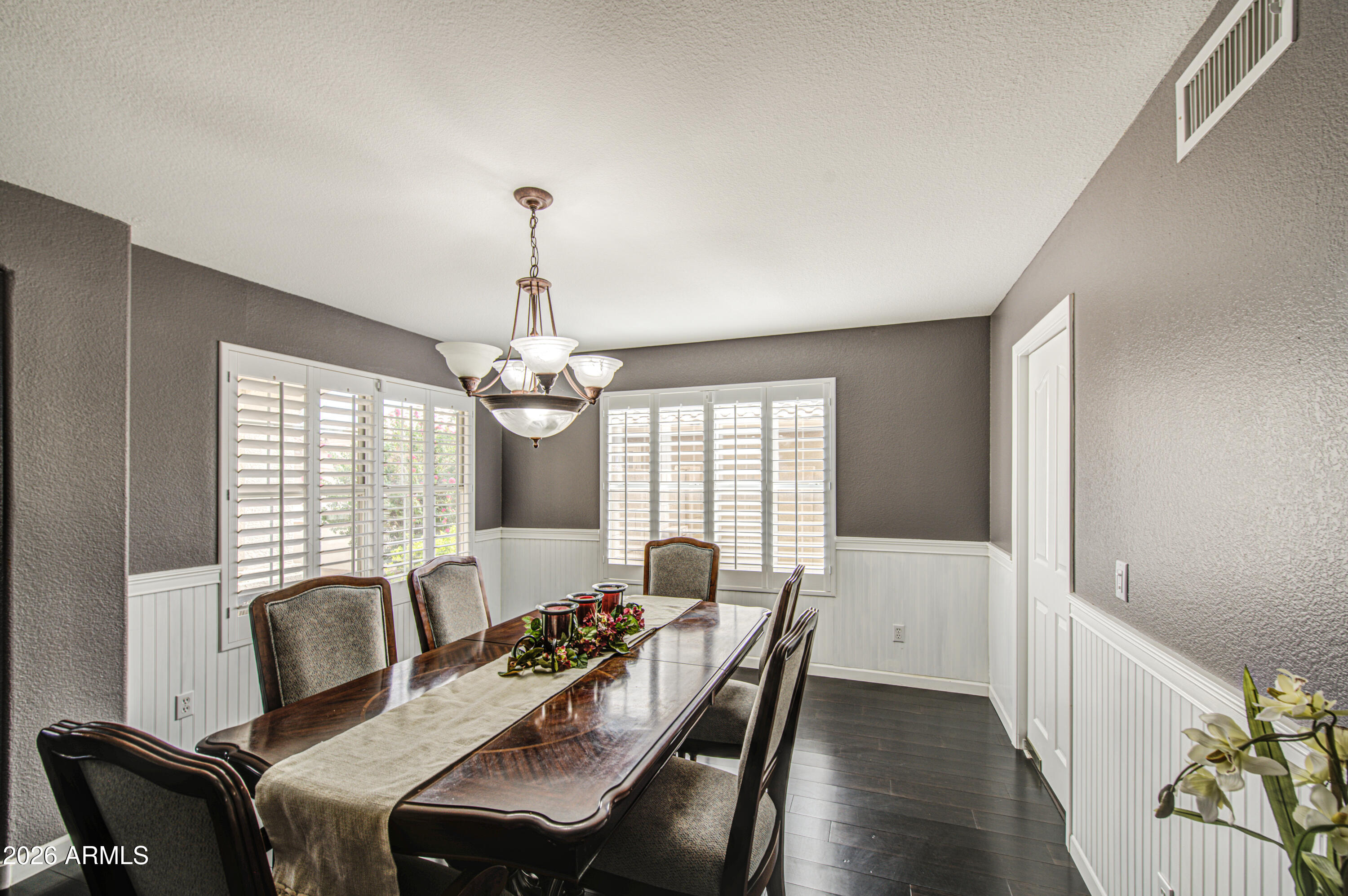 12403 West Monte Vista Road Avondale, AZ 85392 - Photo 11 of 63 a dining room with furniture and window