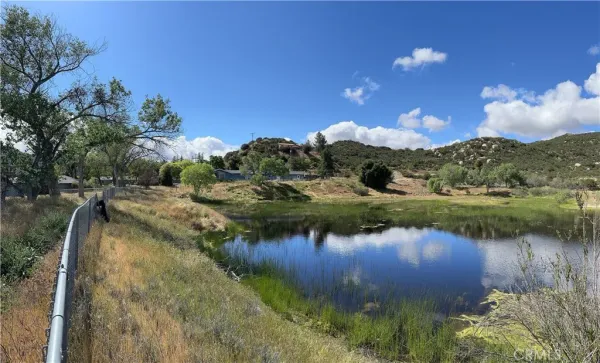 a view of a lake in middle of the town