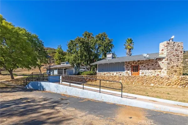 a view of a street with a building in the background