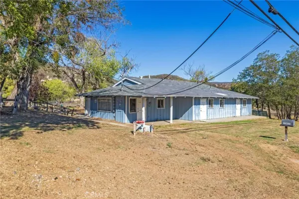 a view of a town with mountains in the background