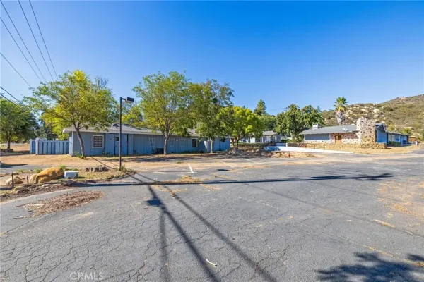 an aerial view of residential house and green space