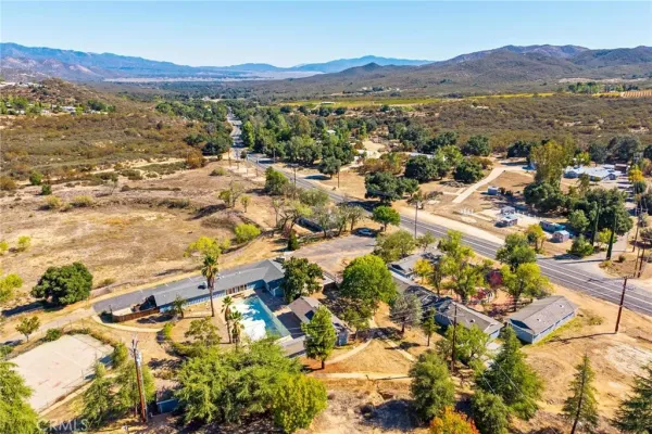 a view of a chairs and table in the terrace