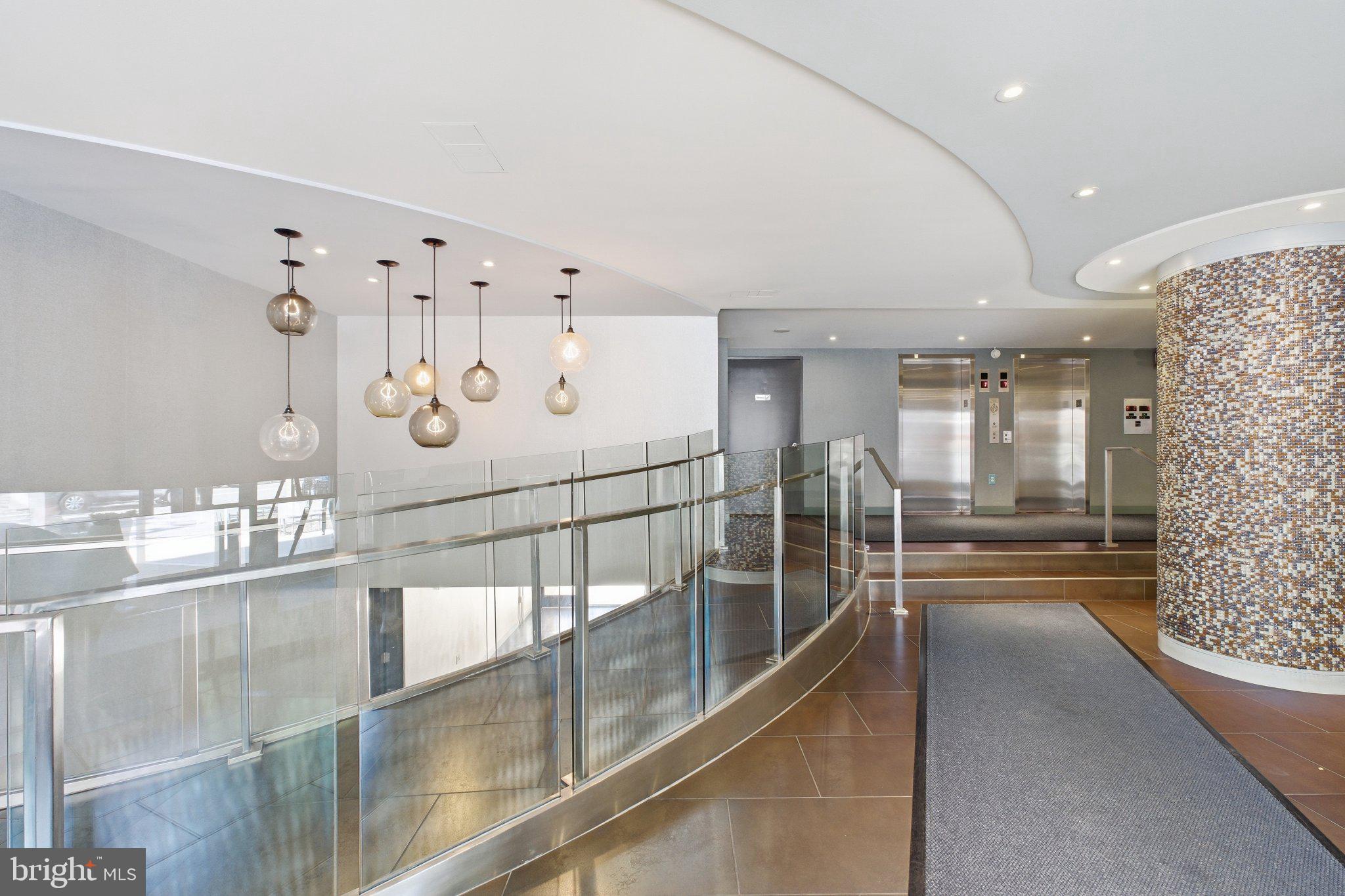 1718 P Street Northwest, Unit 809 Washington, DC 20036 - Photo 21 of 24 Sleek entrance with modern lighting.