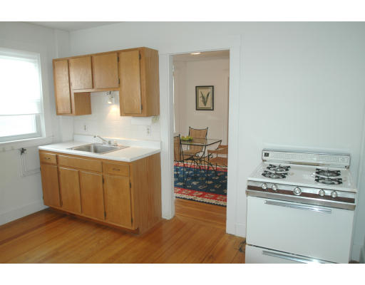 17 Locust Terrace, Unit 2 Cambridge, MA 02138 - Photo 4 of 8 a kitchen with a sink cabinets and appliances