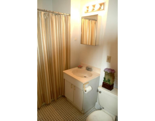 17 Locust Terrace, Unit 2 Cambridge, MA 02138 - Photo 5 of 8 a utility room with a sink dryer and washer