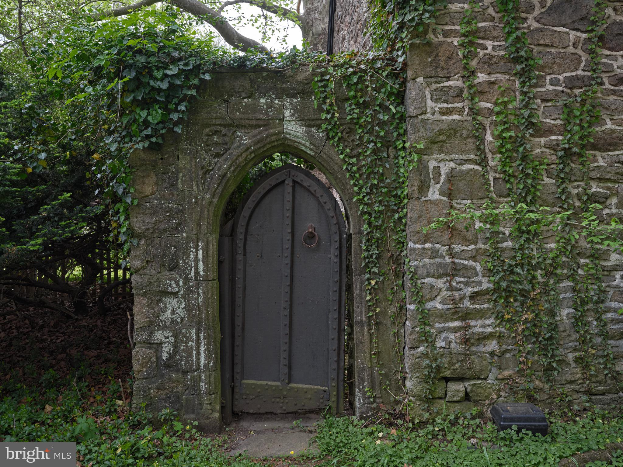 2610 River Road New Hope, PA 18938 - Photo 11 of 22 a stone house with a trees in front of it