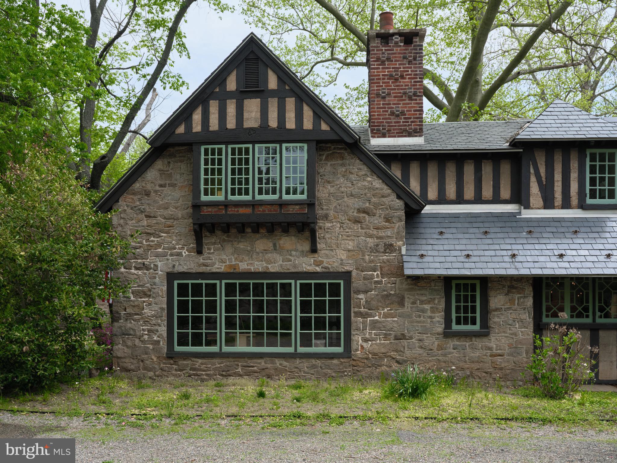 2610 River Road New Hope, PA 18938 - Photo 3 of 22 a front view of a house with a garden
