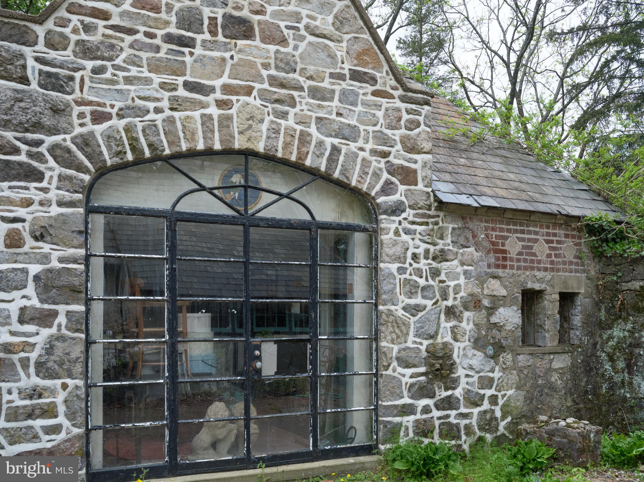2610 River Road New Hope, PA 18938 - Photo 9 of 22 a backyard of a house with table and chairs