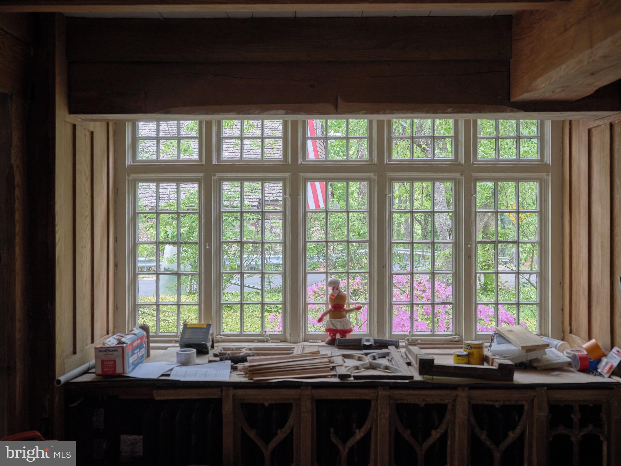2610 River Road New Hope, PA 18938 - Photo 10 of 22 a room with large windows and wooden floor