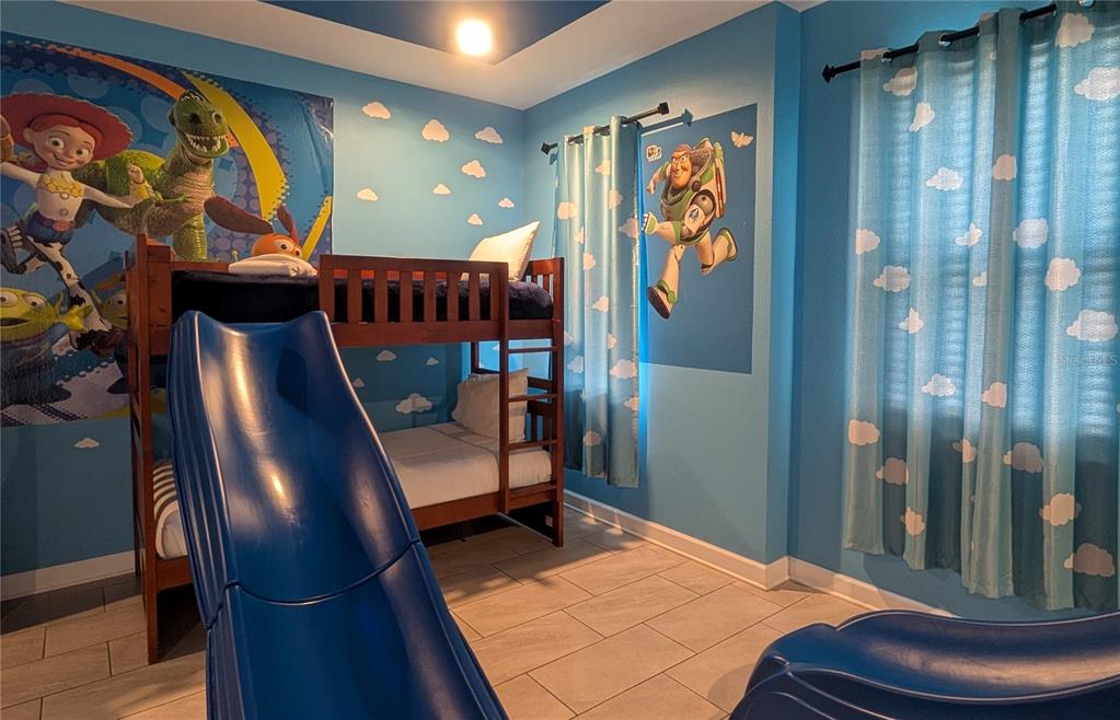 2800 Simile Street Kissimmee, FL 34746 - Photo 15 of 62 a bedroom with window