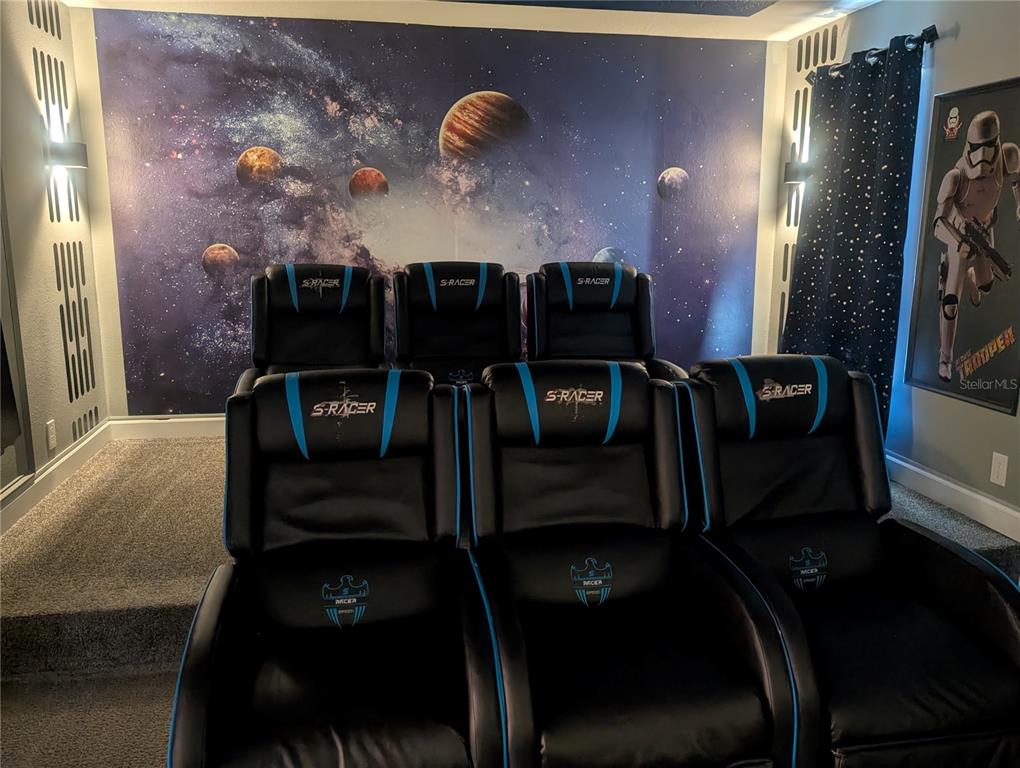 2800 Simile Street Kissimmee, FL 34746 - Photo 39 of 62 a living room with furniture and wooden floor