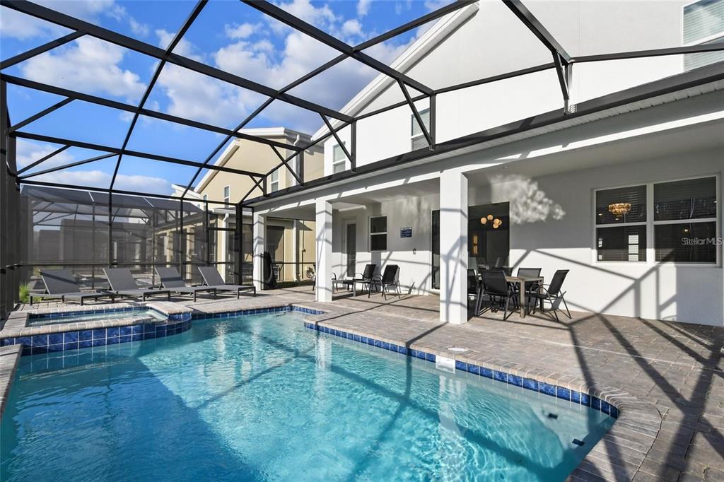 2800 Simile Street Kissimmee, FL 34746 - Photo 49 of 62 a view of a chairs and tables in patio