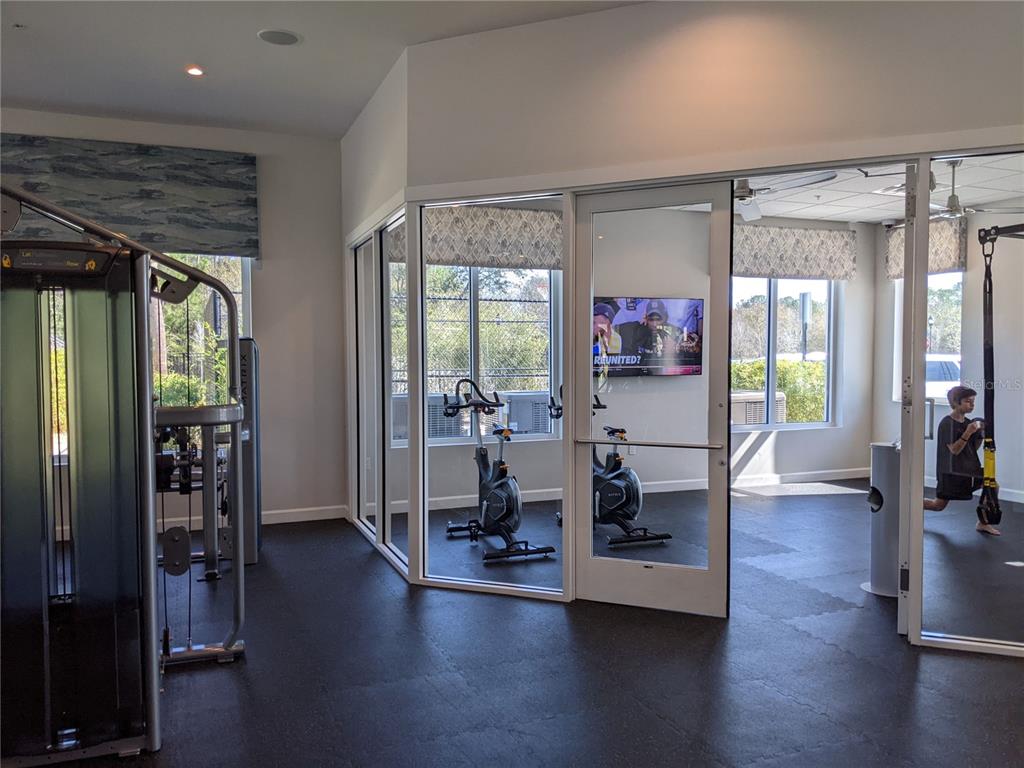 2800 Simile Street Kissimmee, FL 34746 - Photo 55 of 62 a living room with furniture and a large window