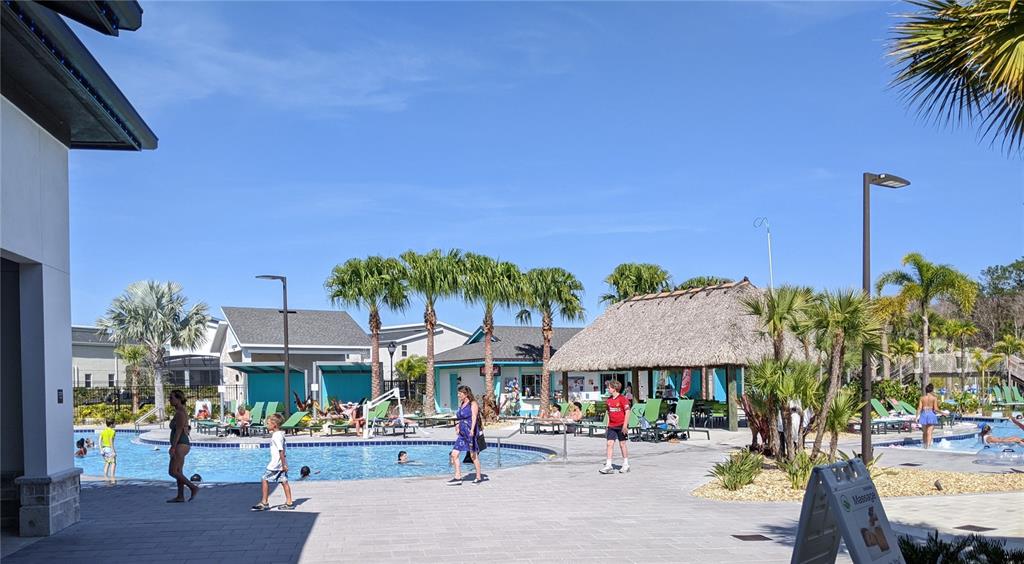 2800 Simile Street Kissimmee, FL 34746 - Photo 57 of 62 a front view of a building with small garden