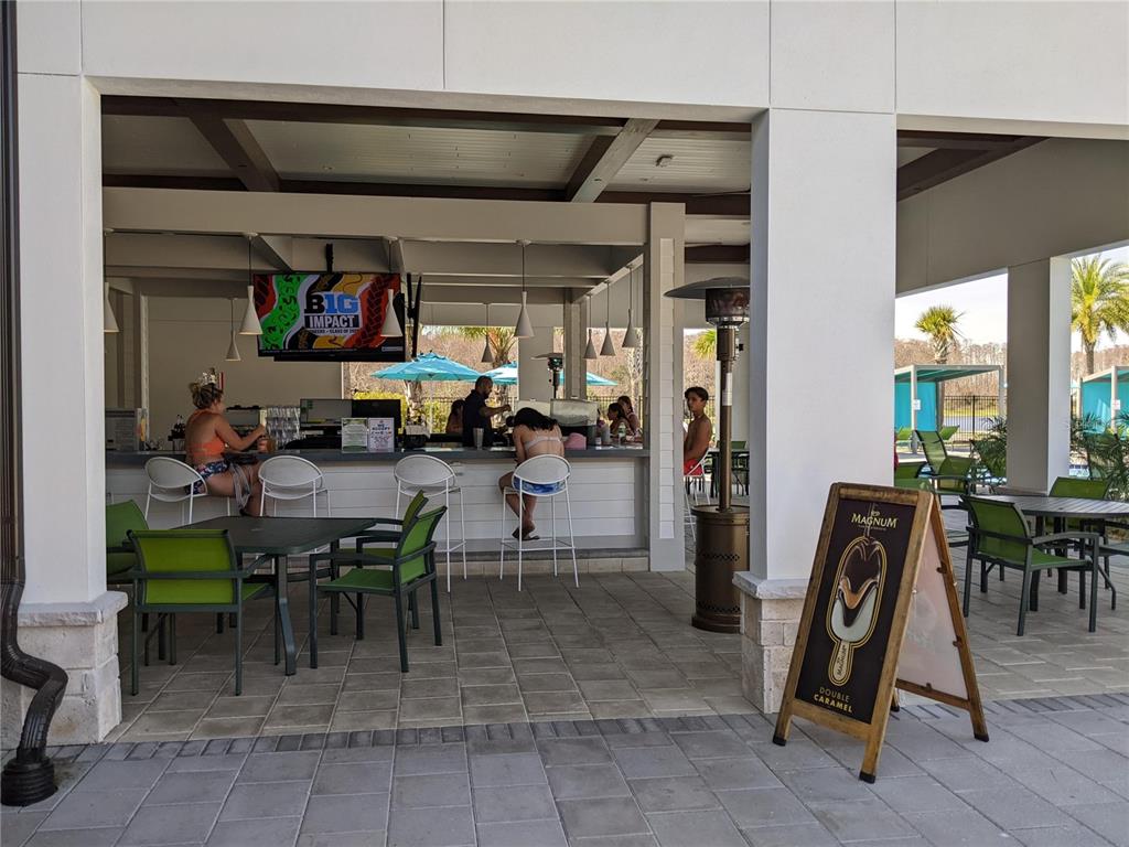 2800 Simile Street Kissimmee, FL 34746 - Photo 59 of 62 a view of a dining area with furniture