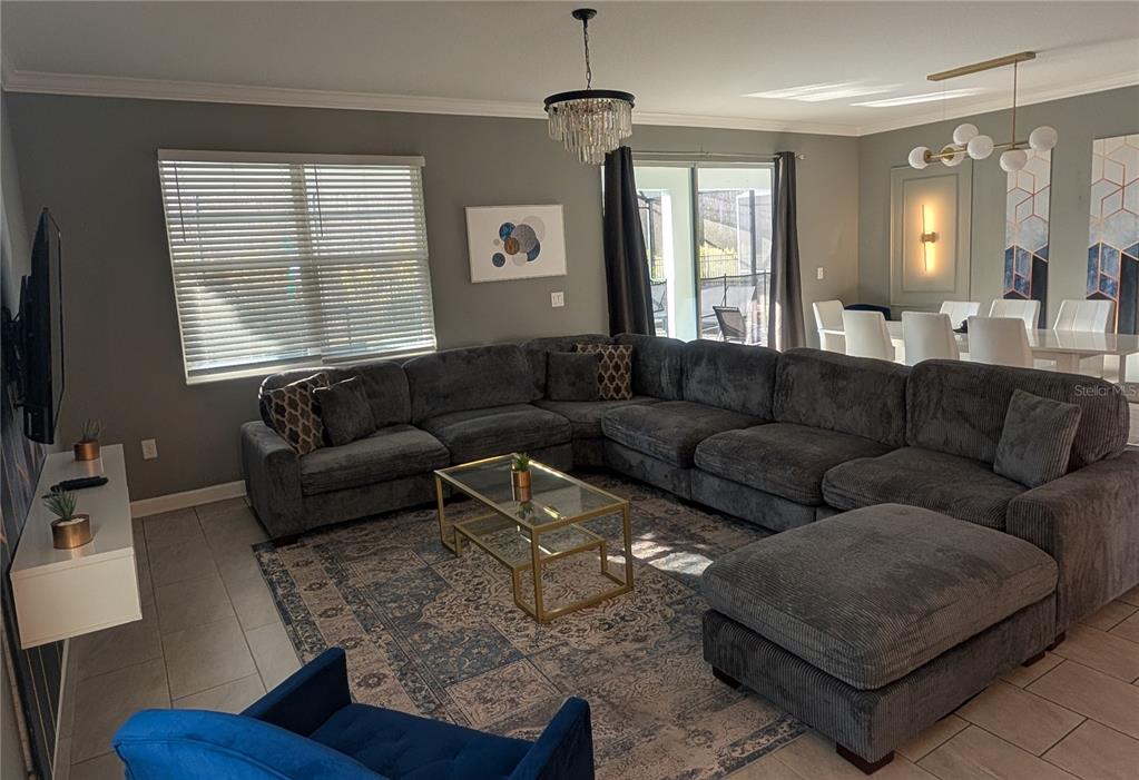 2800 Simile Street Kissimmee, FL 34746 - Photo 6 of 62 a living room with furniture and a window