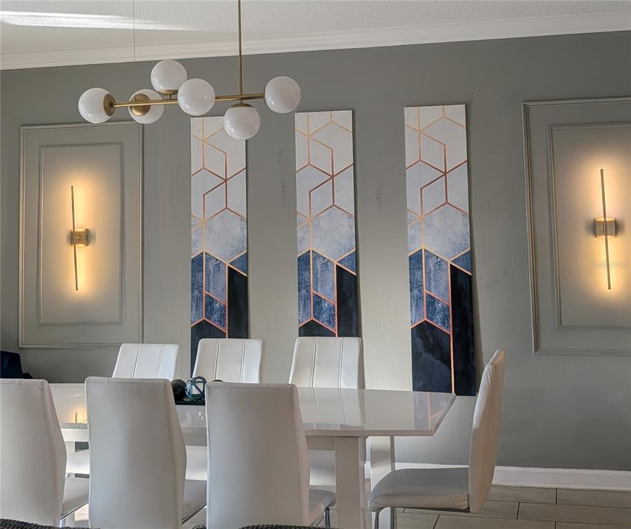 2800 Simile Street Kissimmee, FL 34746 - Photo 10 of 62 a dining room with furniture and window