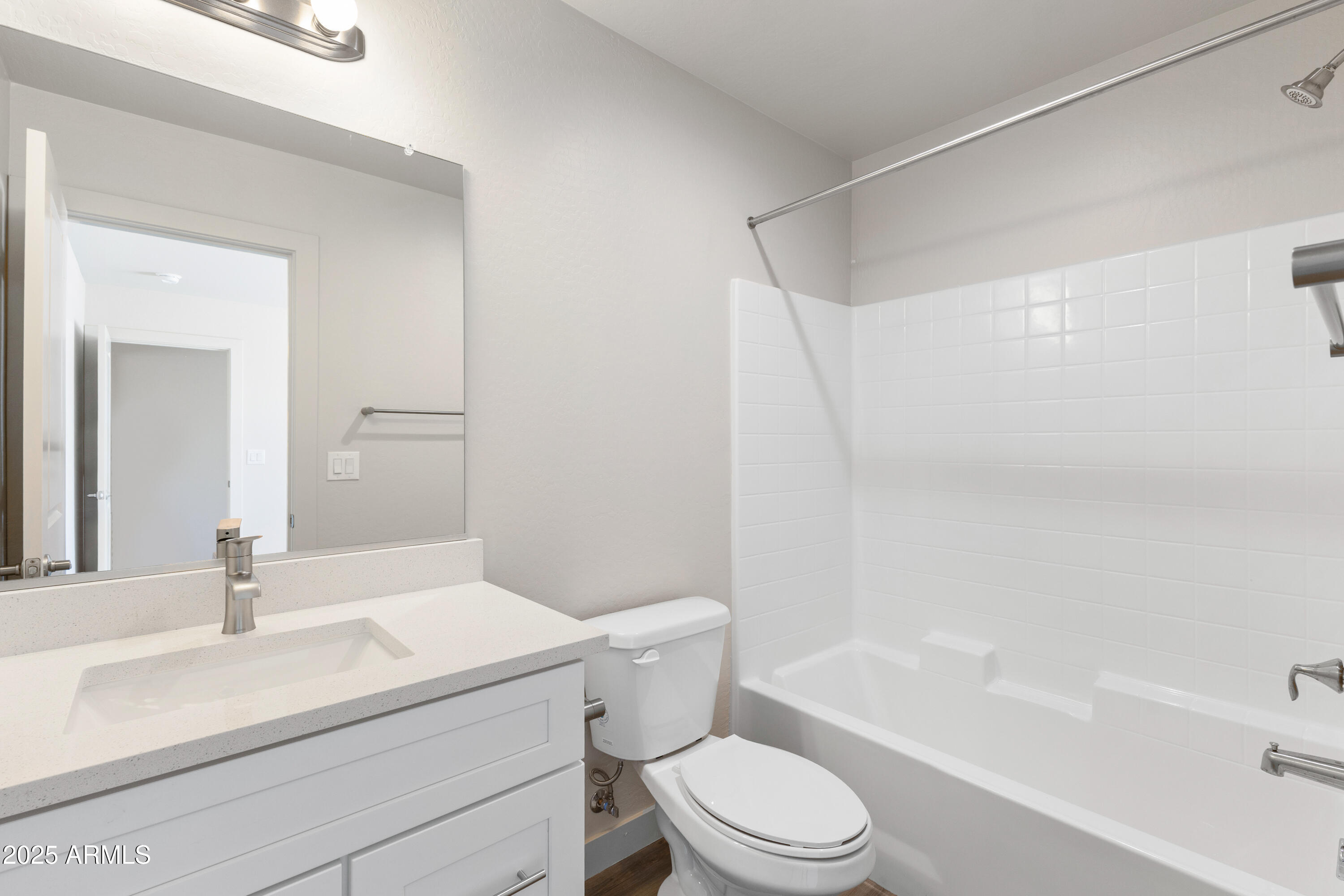 4307 North 13th Place Phoenix, AZ 85014 - Photo 26 of 35 a bathroom with a sink a toilet and a bathtub