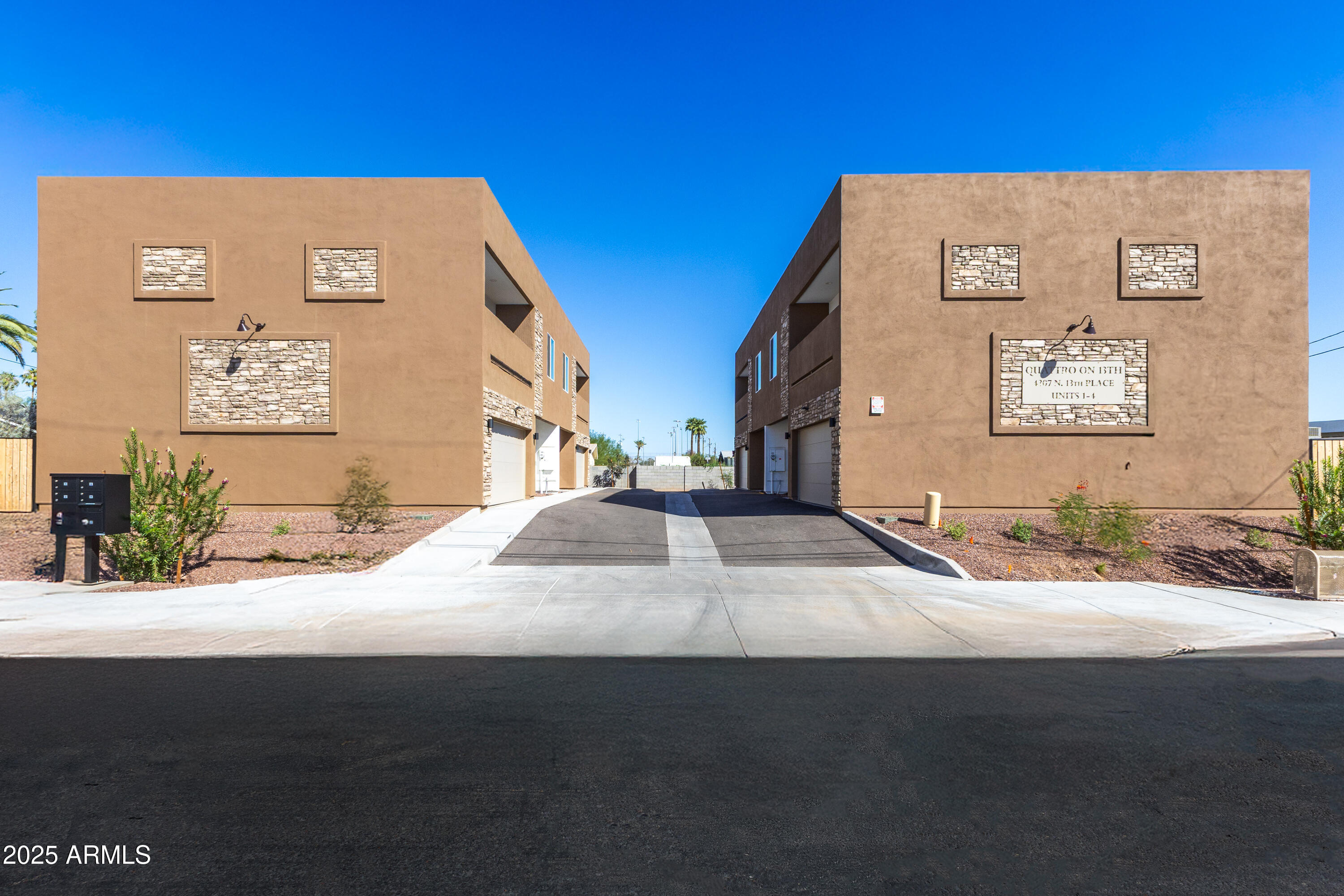 4307 North 13th Place Phoenix, AZ 85014 - Photo 2 of 35 a front view of a building with a yard