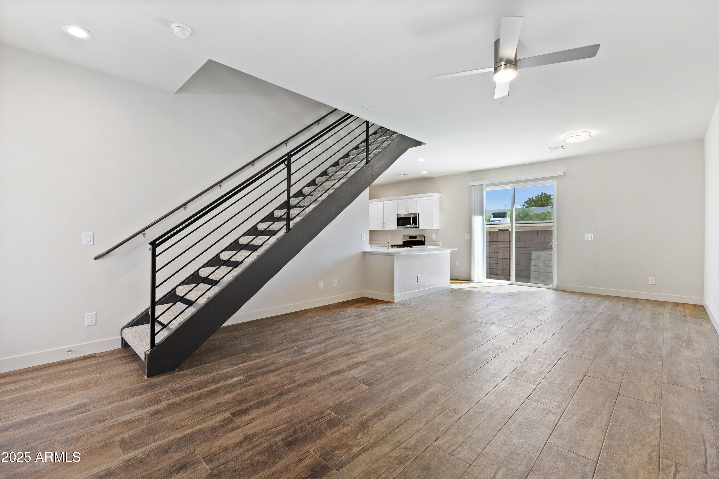 4307 North 13th Place Phoenix, AZ 85014 - Photo 6 of 35 wooden floor in an empty room with wooden floor