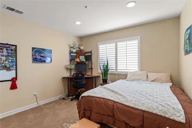 a bathroom with a shower and toilet