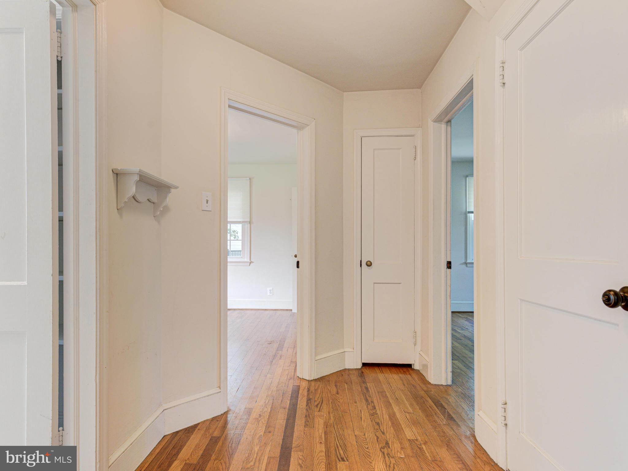 21148 Unison Road Middleburg, VA 20117 - Photo 23 of 52 Living Room Hallway to Main Bedrooms 1 & 2