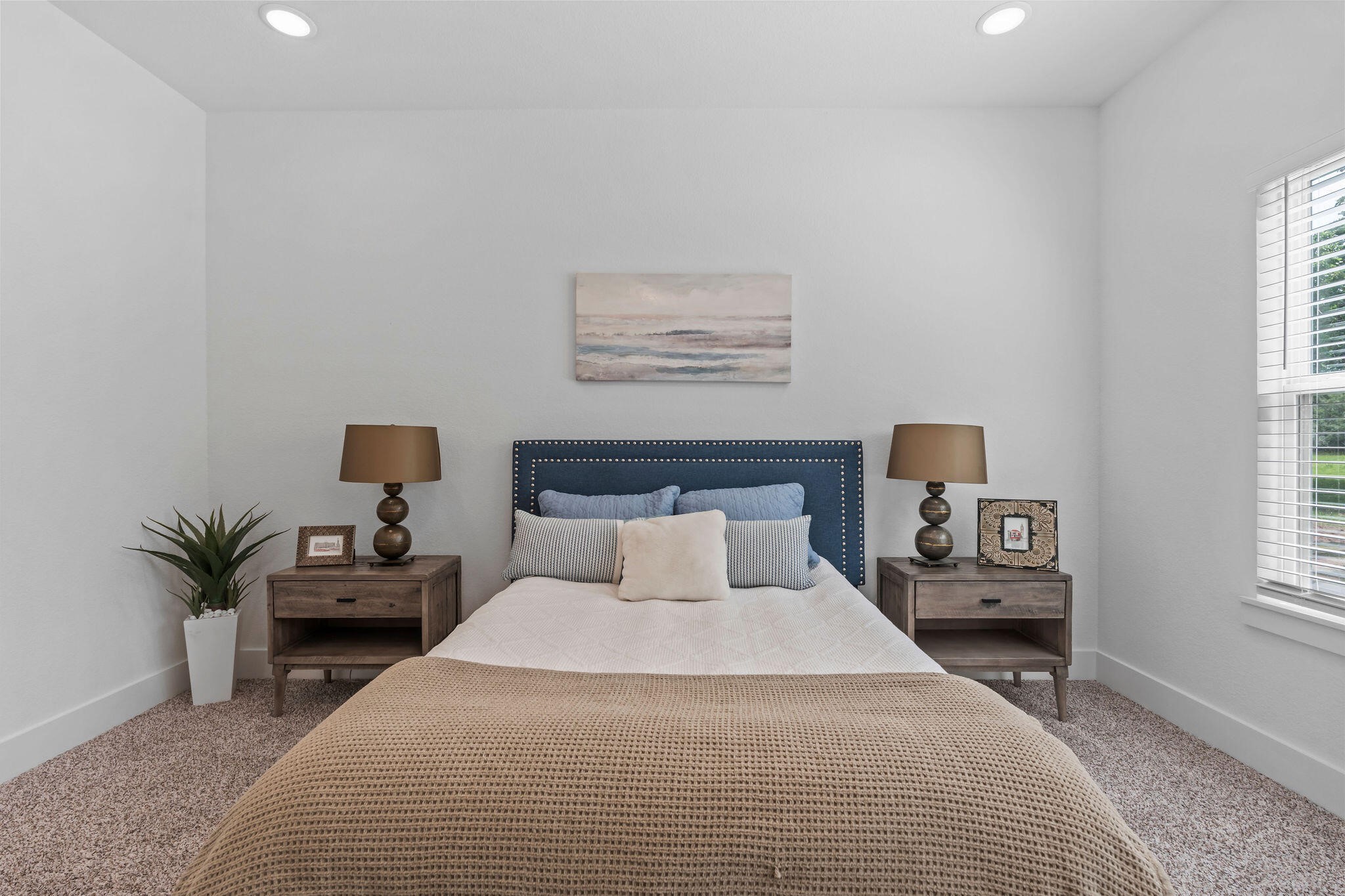 39645 Bosque Road Hempstead, TX 77445 - Photo 17 of 37 a bedroom with a bed and a couch