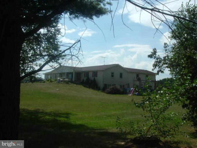 5761 Marsh Road Waynesboro, PA 17268 - Photo 3 of 19 a view of a back yard of the house