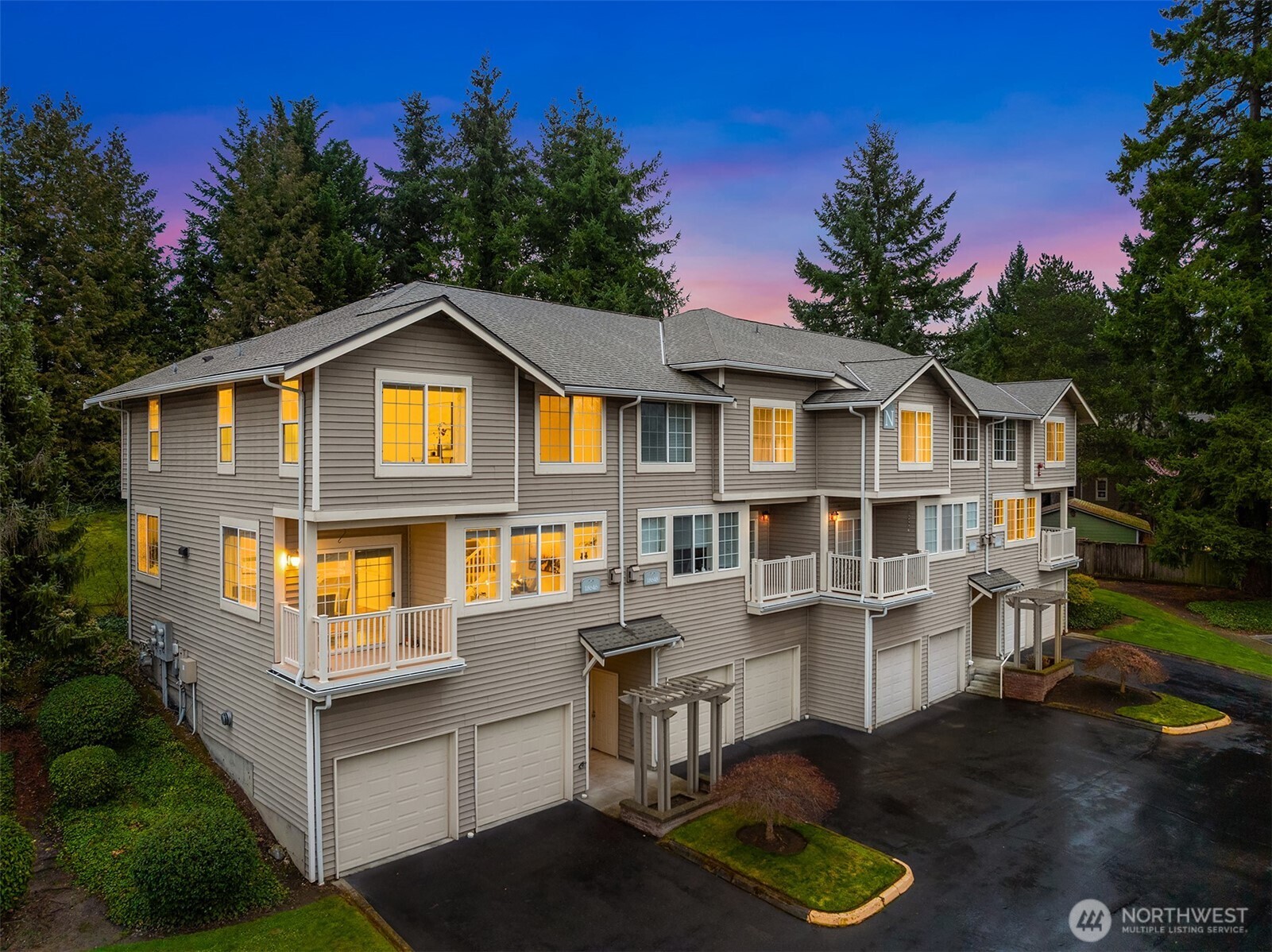 18646 Northeast 57th Way Redmond, WA 98052 - Photo 1 of 40 a front view of a house with garden