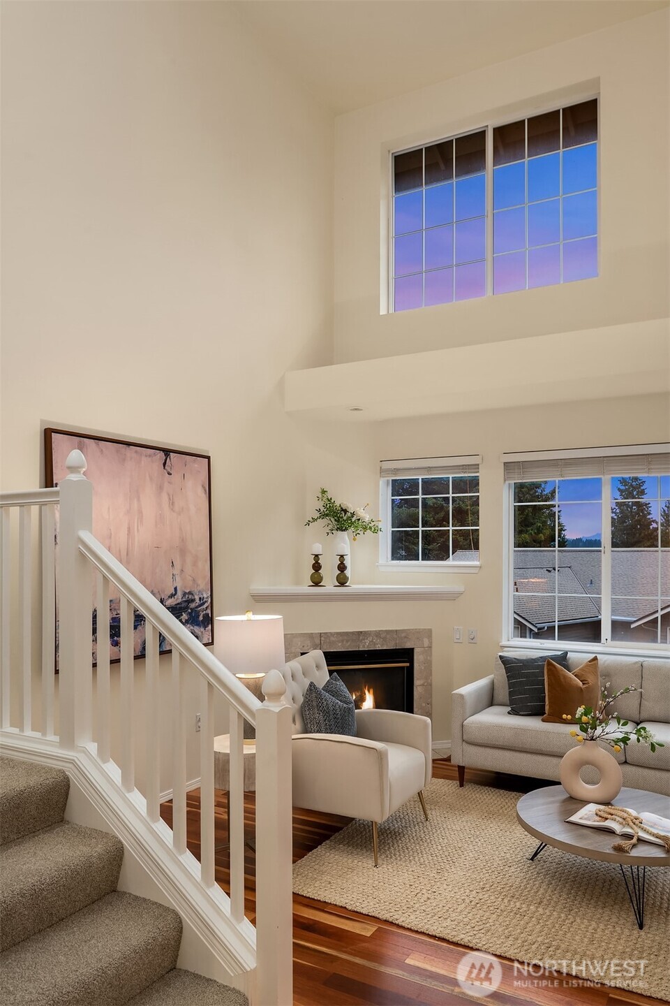 18646 Northeast 57th Way Redmond, WA 98052 - Photo 11 of 40 a living room with furniture and a fireplace