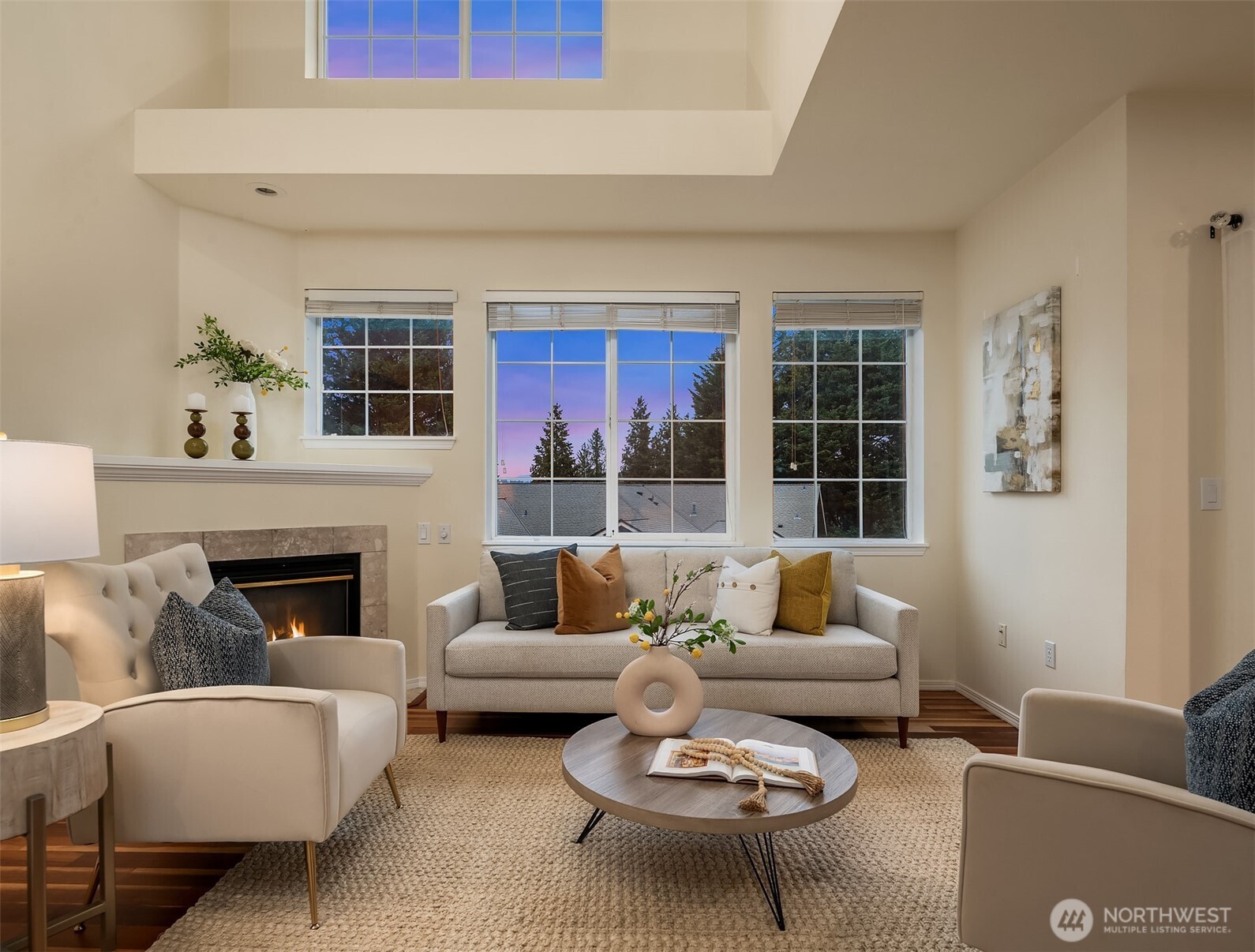 18646 Northeast 57th Way Redmond, WA 98052 - Photo 12 of 40 a living room with furniture and a fireplace