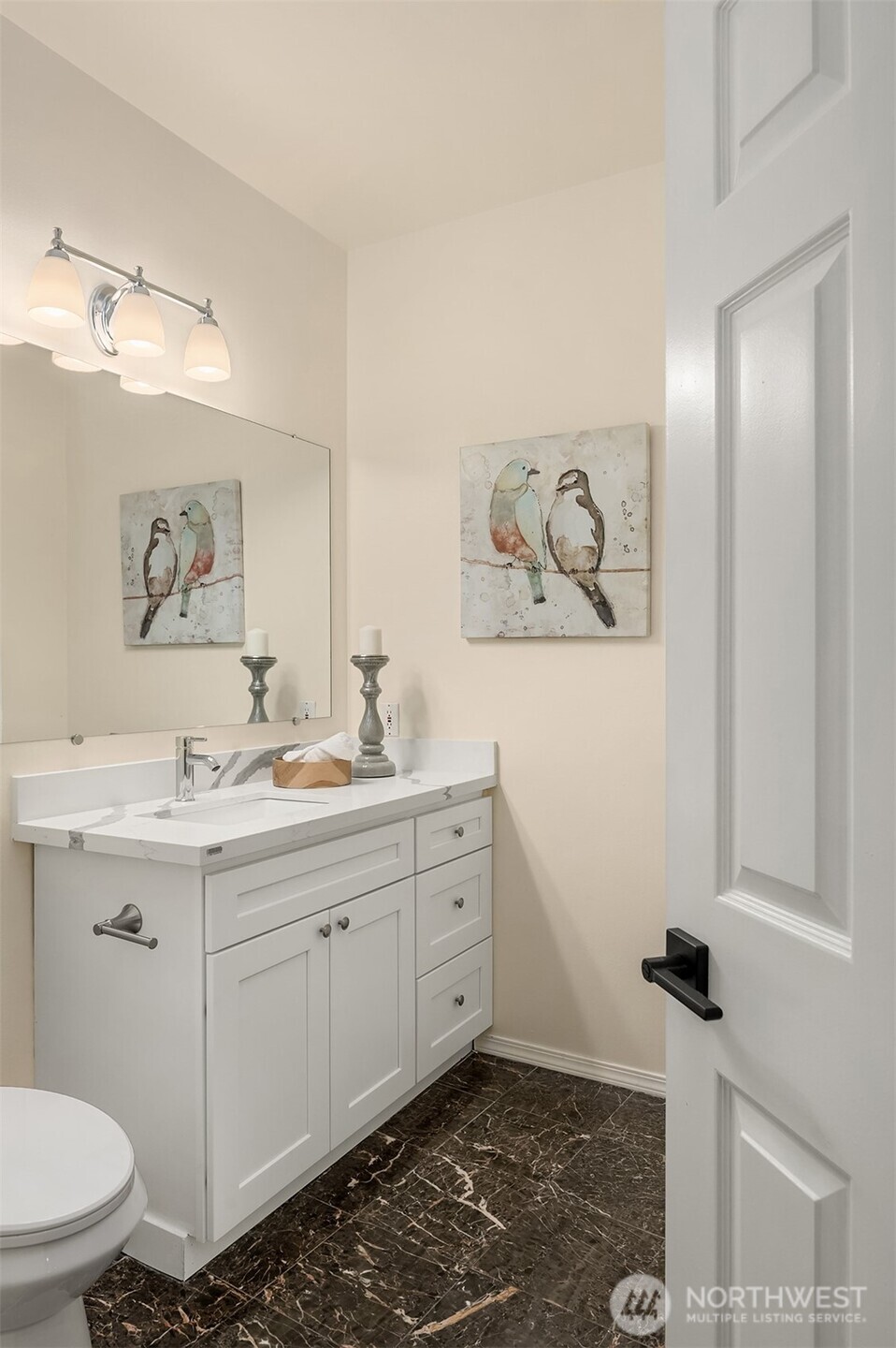 18646 Northeast 57th Way Redmond, WA 98052 - Photo 17 of 40 a bathroom with a sink and a mirror
