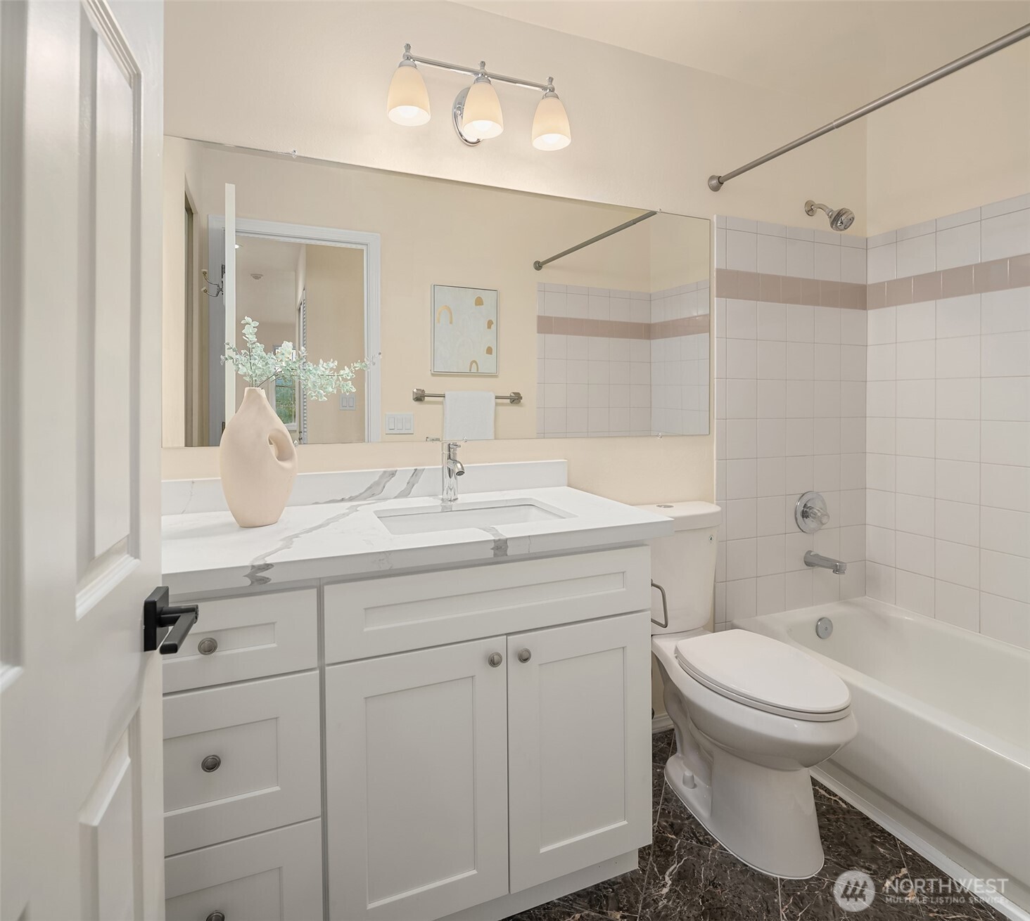 18646 Northeast 57th Way Redmond, WA 98052 - Photo 18 of 40 a bathroom with a sink toilet vanity and tub