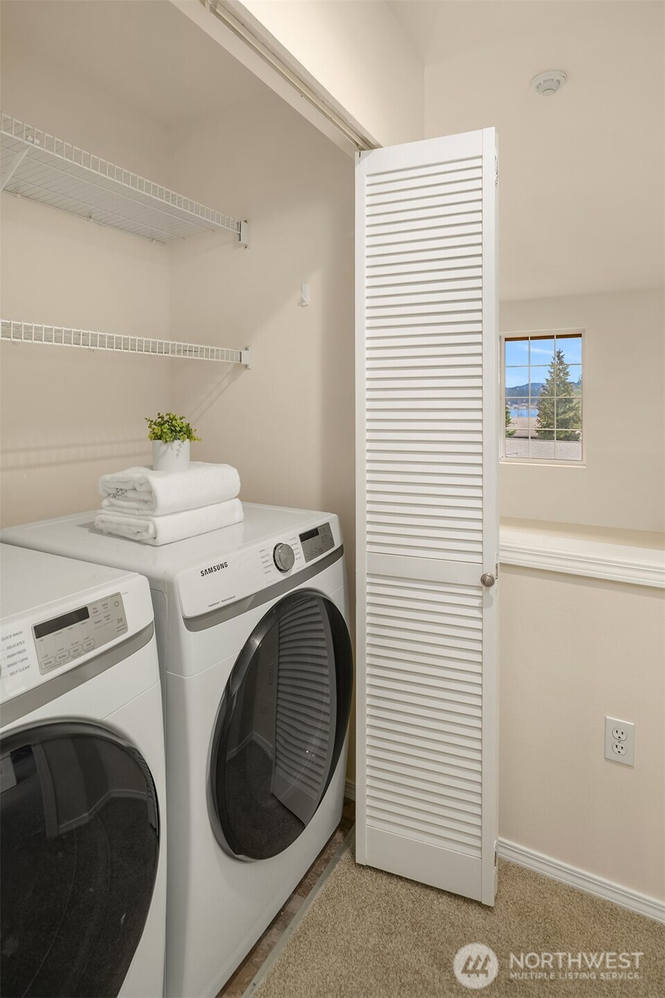 18646 Northeast 57th Way Redmond, WA 98052 - Photo 25 of 40 a utility room with dryer and washer