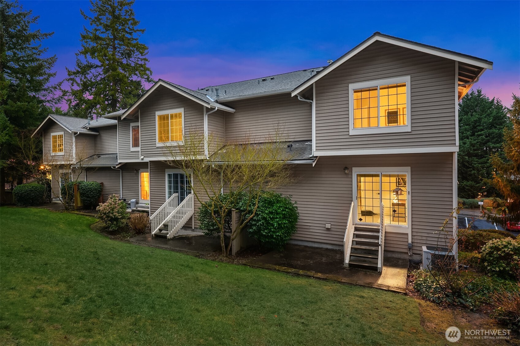 18646 Northeast 57th Way Redmond, WA 98052 - Photo 29 of 40 a front view of a house with garden