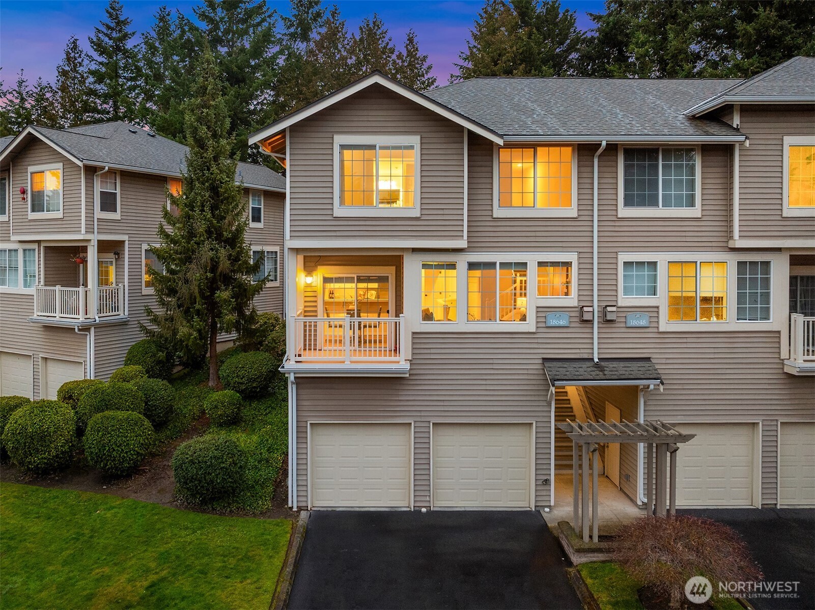 18646 Northeast 57th Way Redmond, WA 98052 - Photo 30 of 40 a front view of a house with a yard