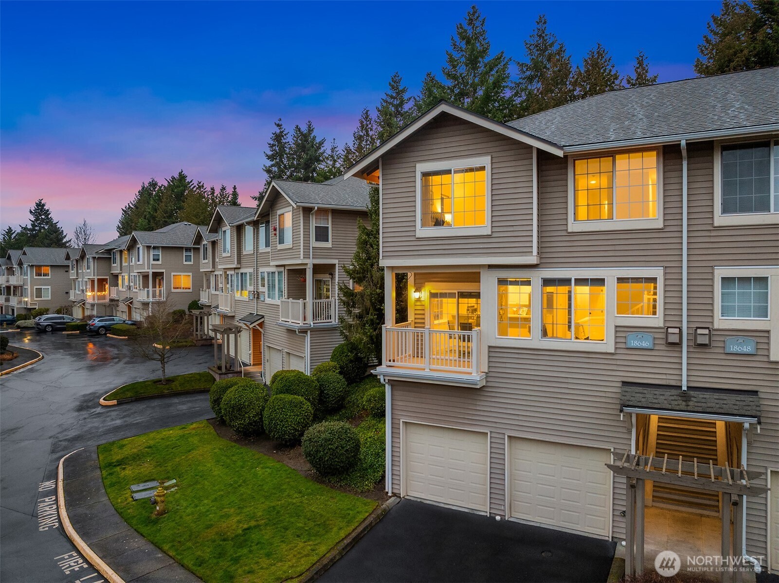 18646 Northeast 57th Way Redmond, WA 98052 - Photo 31 of 40 a front view of a house with a yard