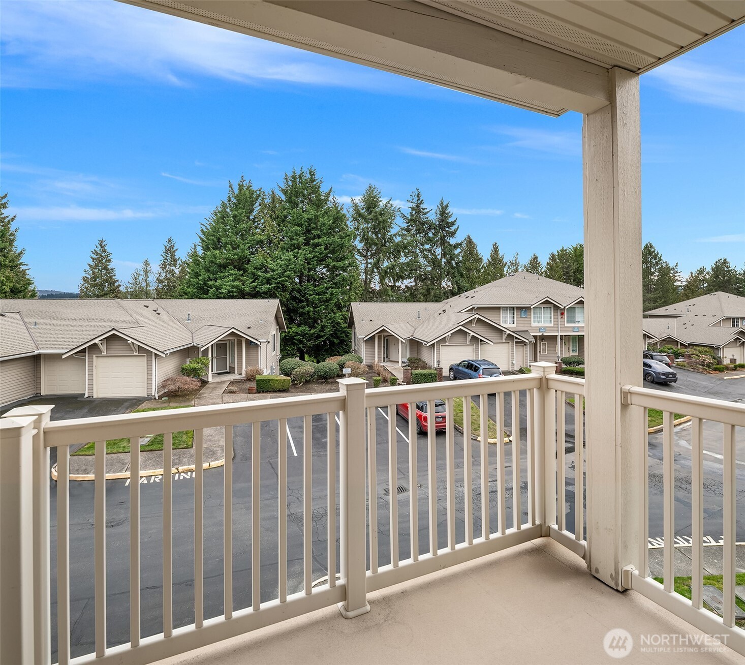 18646 Northeast 57th Way Redmond, WA 98052 - Photo 9 of 40 a view of a street with wooden fence