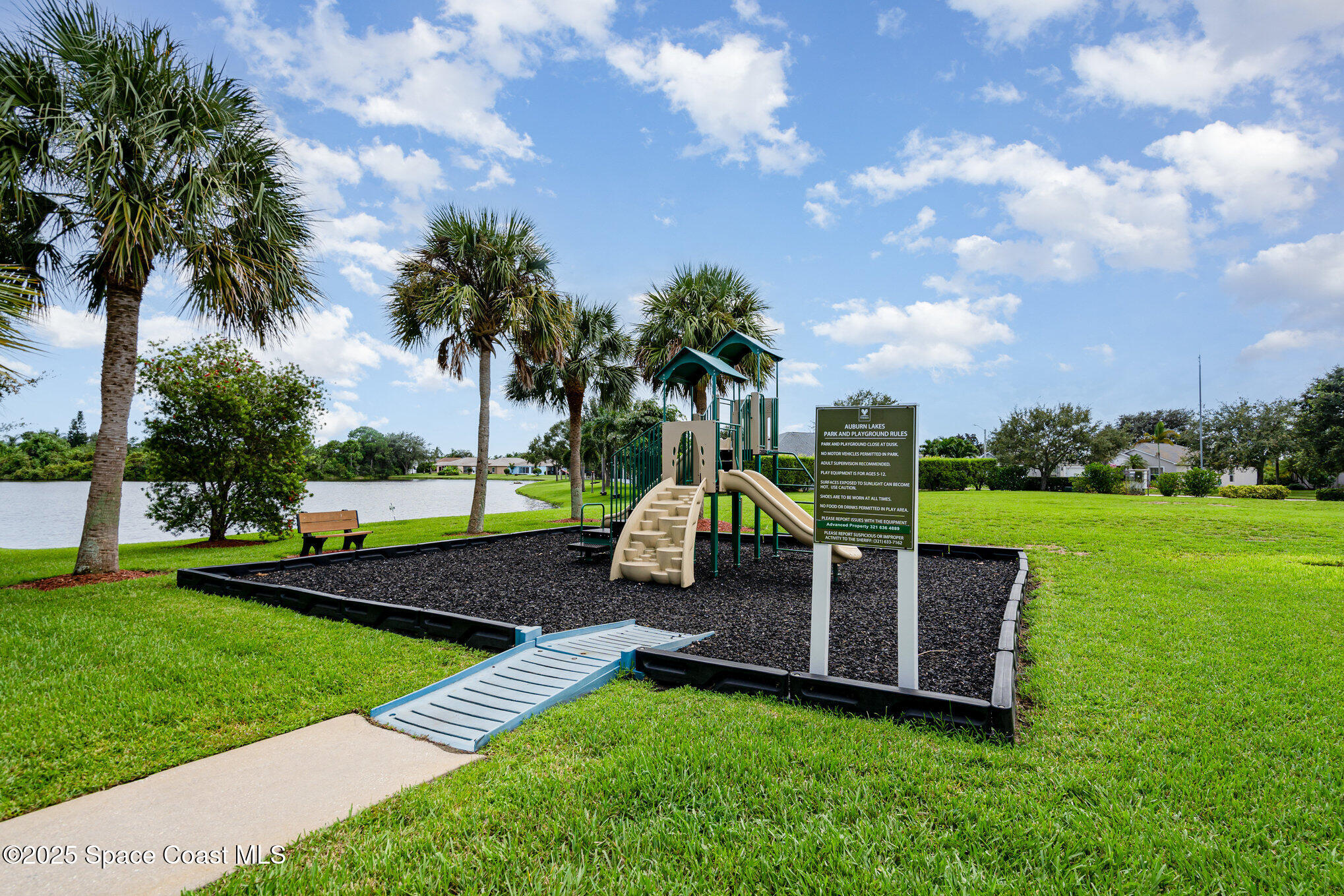 1162 Brumpton Place Rockledge, FL 32955 - Photo 23 of 25 a view of a park with slide